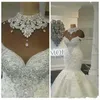 Sexig lyx Dubai Arabiska sjöjungfru bröllopsklänningar brudklänningar hög hals illusion spetsar applikationer kristall pärlor plus storlek tyll formell med blommor öppen rygg