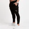 Herrbyxor män svettbyxor 2023 casual mens joggers byxor mode gym fitness bodybuilding fickor boutique sportkläder