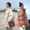 Damskie okopy płaszcze zimowe koreańskie kobieta bawełniana sukienka luźna i w pełni meczowa bawełniana kurtka moda