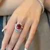 Bagues de cluster Charme Fleur Ruby Bague de doigt 925 Sterling Silver Party Bande de mariage pour femmes Promesse de mariée Bijoux de fiançaillesCluster