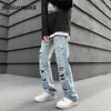 Jeans da uomo strappati Hip Hop High Street Pantaloni da uomo Abbigliamento maschile Pantaloni larghi in denim impilati streetwear casual a gamba larga