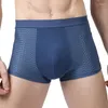 Onderbroek ondergoed mannen ademende snel droge platte boksers mesh holle plus size massief bokser mannelijk elastisch taille ondergoed