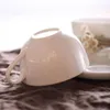 Koppar tefat europeiska te och tefat set Royal Ceramic Gold Bone China Coffee Cup High Quality Tampa de Silicone 50CS50
