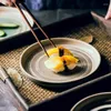 Płytki japońskie czarne okrągłe stek stek ceramiczny zestaw sałatkowy sałatka sałatka sałatka restauracja
