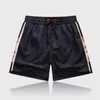 Shorts de grife masculinos de moda de verão secagem rápida roupa de banho estampada calças de praia masculinas curtas tamanho asiático M-XXL