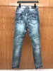 2023 anos Mens angustiados Rapped Hole Designer Jeans ~ Tamanho dos EUA 28-38 Jeans ~ Alta qualidade Motocicleta Moto Motão Biker Calças de jeans de Hip Hope