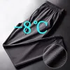 Męskie spodnie 2023 Szybko suszący lodowy jedwabny oddychający dziewięciopunktowy letni cienkościennik fitness luźne spusty klimatyzacyjne siatki