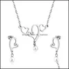 Серьги Ожерелье в форме сердца из нержавеющей стали подвески и расположены в ювелирных изделиях для женщин с цепными украшениями.