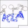 Nyckelringar smycken Creative 26 Initialer Brev Blue Sky Cloud Keychain för bilnycklar Akrylharts Charm Bags Girl Christmas Gift Drop Dhmvx