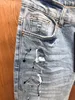 2023 printemps hommes en détresse déchiré maigre beau trou designer jeans ~ taille américaine 28-38 jeans ~ tops qualité slim moto moto biker causal denim pantalon hip hop jeans