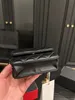 Ünlü CC Tasarımcı Çanta Üst Lüks Mini Woc Omuz Çantaları Kadınlar Flap Crossbody Çanta Zincir Tasarımcılar Tote Çanta Deri Siyah Kapiteli Çanta Cüzdan