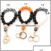 Porte-clés Bijoux 12 Couleurs Noël Halloween Perle En Bois Bracelet De Noël Porte-clés De Qualité Alimentaire Perles De Sile Bracelets Femmes Fille Dhf1Z