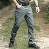 メンズパンツは大規模なマルチポケットアーミーカーゴ戦闘戦術パンツカジュアルコットンセキュリティ長いズボンジョガーメンメンズ