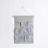 Opbergdozen 7 Pocket Snowflake Printing Muur gemonteerde tas Hanggarderobe Organisator Sieraden Cosmetica Speelgoed Make -up zakje Container