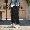 Men's Pants Mens Harajuku Harem 2023 Overalls Men Streetwear Black Cargo Male Loose Vintage Baggy Hip Hop Joggers For