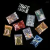 Sacs de rangement 100 pièces imprimés Mini bijoux dessin animé motif cristal pochettes d'emballage sac à fermeture éclair réutilisable