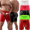 Mutande Intimo da uomo Boxer Slip con apertura sul cavallo PU Lingerie in pelle U Custodia convessa Pantaloncini in vernice nera