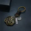 Keychains Vintage Bronze Alloy Hollow Out Flower Charm Woven Leather Lettering Metal Keyrings Pendant Key Chain Trendy Jewelry