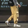 Men's Pants Mens Harajuku Harem 2023 Overalls Men Streetwear Black Cargo Male Loose Vintage Baggy Hip Hop Joggers For