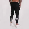 Pantaloni da uomo in cotone Jogging Uomo 2023 Pantaloni sportivi casual da uomo con coulisse Pantaloni slim fit solidi Pantaloni skinny Fitness Sport