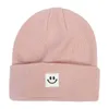 Bérets sourire étiquette femmes hiver tricoté Bonnet unisexe Bonnet chapeau pour hommes HipHop Ski casquette Skullcap couleur unie Crochet Skullies