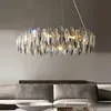 Lampade a sospensione Lampadario di cristallo moderno di lusso per soggiorno Design rotondo / ondulato Sospensione Cristal Lustre Lampadari da pranzo a isola dorataPenna