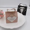 ギフトラップ50/100 PC/パック素敵なピンクのブライダルケースGroom Tuxedo Bride Dress Gown Ribbon Wedding Favor Candy Box