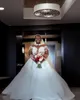 Abiti da sposa 2023 Ball Gown Luxury Jewel Neck Perline di cristallo Illusion Maniche lunghe Tulle Dubai Arabo Sposa Abiti da sposa Taglie forti