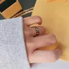 Logogravyr designer FF Ring Extravagant emalj svart vit Guld Silver Rose 316L Rostfritt stål bokstavsringar Kvinnor män bröllop Smycken Dam Festpresenter 6 7 8 9