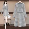 Robes décontractées Femmes Tricot 2023 Hiver Vintage Houndstooth Robe bleue à manches longues Gland Boutons de perles Une ligne Mini Chic Vêtements