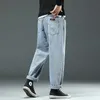 Jeans masculinos Primavera Moda do verão solteira Ponta de perna larga e larga de rua Man Streetwear Coreano Hip Hop Troushers Plus Size 42