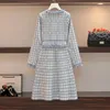 Robes décontractées Femmes Tricot 2023 Hiver Vintage Houndstooth Robe bleue à manches longues Gland Boutons de perles Une ligne Mini Chic Vêtements