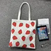 ストレージバッグダムズaardbei gedrukt schoudertas heren canvas tas groene boodschappentas grote capaciteit vouwen handtas必需品