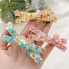 Accessori per capelli Bambini Colori carini Clip floreali per ornamento con fiocco incrociato Ragazze adorabili barrette dolci Forcine per capelli Bambini