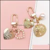 Anahtar halkalar kız için sevimli inci kabuğu yaratıcı küçük hediyeler ins metal mücevher kolye anahtar zincir bayanlar moda aksesuarları down dağıtım otpgs