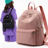 Bolsas escolares Bolsa de hombro Ocio al aire libre para mujer Gran capacidad Mochila antirrobo Repelente al agua Nylon Color sólido Portátil Ita