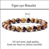 Charm Bracelets Natural Stone Beads Tiger Eye Bracelet Classic Men Women Buddha Black Lava Yoga Energy Accessories Q84Fz Drop Delive Dhexd