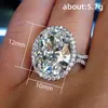 Anneaux de mariage tempérament élégant ovale cubique zircone bandes de cristal pour les femmes couleur argent luxe mode dame bijoux