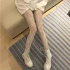 Chaussettes Lolita noires et blanches pour femmes, bas résille en dentelle florale ajourée, collants gothiques Sexy Kawaii