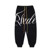 2023 Nouveaux pantalons pour hommes North American High Street Marque Rhude Lettre Laine douce tricotée Version Os décontractée Portant Magie Hip Hop Mode Chaude