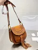 famous cowhide vintage husdon Saddles Tassel bag Totes shoulder bags Luxury Designer Fashion travel pochette women's mens Leather handbag crossbody small clutch