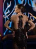 Seksowna czarna syrena wieczorowa sukienka Illusion z kwiatowym aplikacją długie rękawy zamek błyskawicz