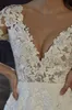 Abiti da sposa sexy con scollo a V maniche lunghe A Line Abiti da sposa con paillettes lucidi in pizzo Boho Country Abiti da sposa Illusion Back Buttons Plus Size Robes de Mariee Sposa CL1736