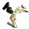 2023 Klasik Cowhide Tasarımcı Kadın Ayakkabı Seksi Bar Banquet Prenses Düğün Lady Süper Kalın Yüksek Topuk Ayakkabı 10cm Metal Toka 100% Deri Siyah Altın Yüksek Topuklu