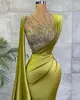 2023 Abiti da sera Green Olive Green Olive Sirenela senza manica illuso con perline Illuso illustrato Occasioni formali su misura indossare abiti da ballo arabo Vestidos