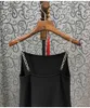 Arbetsklänningar högkvalitativa tröjor uppsättningar 2023 Autumn Winter 2 Piece Set Women Långärmning stickad Cardigan Black Strap Dress Casual Suits