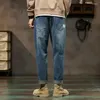 Mäns jeans baggy män harem byxor löst fit wide ben vintage kläder casual manlig denim byxor streetwear lappade fickor hiphop kpop