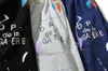 Męskie szorty Tech Krótkie spodnie Mężczyźni Kobiety Projektant Bryczesy Bawełna Mans Koszula na co dzień Luksusowa odzież Uliczne szorty Rękawy Zrelaksowane modne spodnie