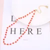 Collier de perles de cristal rouge pour femmes, style bohémien, chaîne en or avec strass simples, accessoire de plage d'été, cadeau ras du cou