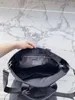 Sac fourre-tout noir à fermeture éclair Sac de créateur de marque co-marqué femmes sac à main de grande capacité sac à provisions sac à bandoulière en nylon sac à bandoulière unique de luxe printemps